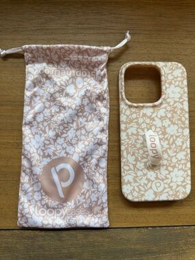Loopy Case cream and white  Floral Phone Case with Grip Strap and bag.